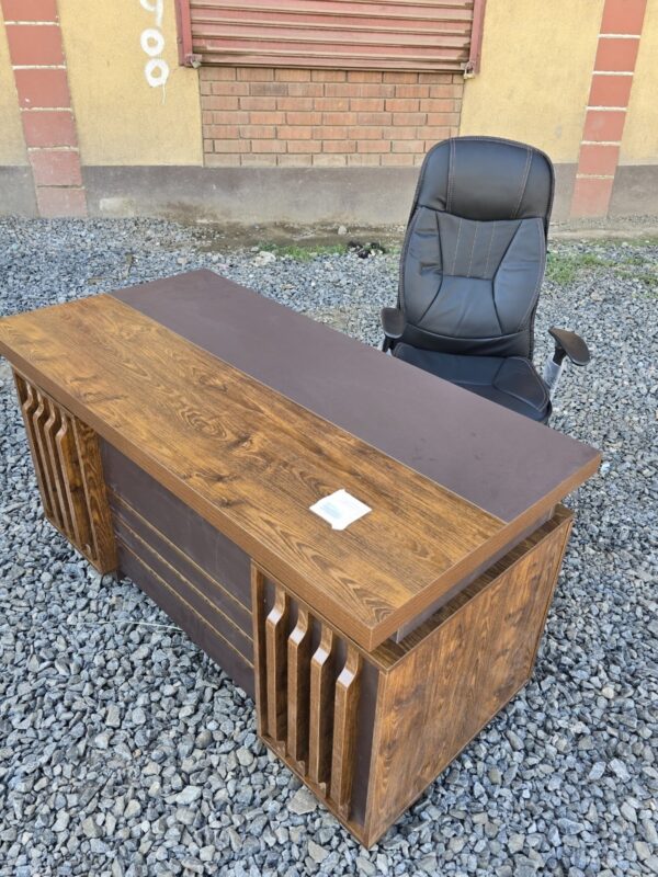 executive office desk, modern executive desk, luxury executive desk, ergonomic executive desk, L-shaped executive desk, U-shaped executive desk, executive office table, CEO office desk, director office table, premium executive desk, imported executive office desk, executive desk with drawers, spacious executive desk, executive computer desk, executive writing desk, executive table with storage, large executive office desk, wooden executive desk, metal executive desk, glass top executive desk, black executive desk, white executive desk, walnut executive desk, mahogany executive desk, professional executive desk, adjustable executive desk, electric height adjustable desk, smart executive office desk, high-end office desk, stylish executive office desk, contemporary executive desk, modern office furniture, classic executive desk, office desk with return, corner executive office desk, durable executive table, executive desk with cabinets, sleek executive desk, workstation executive desk, executive table for managers, best executive desk design, custom executive desk, imported executive table, minimalist executive desk, robust office desk, boardroom executive desk, high-quality executive desk, executive office setup, executive desk for home office, manager office desk, commercial executive desk, director desk Kenya, office table Nairobi, executive desk Kenya, business executive desk, premium office furniture, office table with pedestal, top-rated executive desk, lockable drawer executive desk, spacious worktop executive desk, modular executive office desk, elegant office desk, desk with side return, executive desk with shelves, professional workspace desk, workstation with executive finish, dual-tone executive desk, office desk with cable management, executive desk for productivity, executive workstation table, wide executive desk, deep surface office desk, high-back executive office furniture, imported wood desk, L-desk executive style, U-desk executive style, formal office furniture, polished wood executive table, executive table with modesty panel, office desk with filing cabinet, classic design desk for executives, glass and wood executive desk, curved executive desk, rectangular executive office desk, executive table with accessories, smart tech-enabled executive desk, integrated power module desk, wireless charging executive desk, stylish wood grain executive desk, office furniture for CEOs, modern director’s desk, ergonomic workspace desk, professional desk with drawers, elite executive furniture, high performance executive office desk, wooden laminate executive desk, MFC executive table, MDF executive desk, particle board executive table, luxury home office executive desk, contemporary office workstation, best value executive desk, wide workspace executive desk, corporate executive desk, workspace for executives, work desk for office executives, elite desk for directors, high productivity desk, senior manager desk, executive table with leather inlay, table with privacy screen, ergonomic layout desk, classic oak executive desk, high gloss finish executive desk, luxury curved desk, spacious executive table with return, walnut veneer desk, desk with lockable drawers, CEO workstation desk, executive suite desk, premium build executive table, professional executive workspace, classy executive office table, functional executive desk, office table with mobile pedestal, solid build executive desk, imported Italian office desk, elegant finish executive table, compact executive desk for office, heavy-duty executive office desk, desk with adjustable height, executive table for corner office, designer executive desk, formal executive work desk, desk with built-in power sockets, business class executive table, premium laminate executive desk, wood veneer executive table, steel frame executive office desk, classic brown executive table, executive desk with bookshelf, desk with return and storage, ergonomic and stylish desk, director’s office table with drawers, modern black executive office desk, sleek and professional desk, executive furniture with storage solution, and refined luxury office desk.