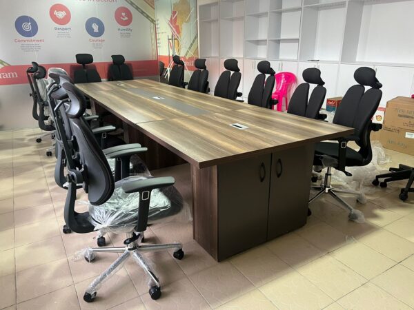 boardroom table, office boardroom table, executive boardroom table, large boardroom table, rectangular boardroom table, round boardroom table, oval boardroom table, modular boardroom table, wooden boardroom table, modern boardroom table, luxury boardroom table, boardroom table with chairs, glass boardroom table, U-shaped boardroom table, V-shaped boardroom table, folding boardroom table, conference boardroom table, boardroom table for sale, best boardroom table, boardroom furniture, boardroom meeting table, high end boardroom table, boardroom table Kenya, boardroom table Nairobi, boardroom table price, spacious boardroom table, corporate boardroom table, formal meeting table, boardroom table set, premium boardroom table, boardroom table with power outlets, boardroom table with cable management, contemporary boardroom table, sleek boardroom table, boardroom table with storage, custom boardroom table, boardroom table with modesty panel, boardroom table with metal legs, office meeting table, boardroom table designs, modern office boardroom table, executive meeting table, luxury meeting table, boardroom table suppliers, imported boardroom table, stylish boardroom table, boardroom conference table, durable boardroom table, boardroom desk, boardroom table with data ports, compact boardroom table, boardroom workspace table, ergonomic boardroom table, collaborative boardroom table, boardroom table with power module, tech-ready boardroom table, boardroom furniture set, best boardroom setup, executive boardroom furniture, boardroom table and chair combo, high capacity boardroom table, spacious meeting table, office conference table, boardroom discussion table, boardroom tables and chairs, budget boardroom table, affordable boardroom table, office table for boardroom, boardroom table top quality, customizable boardroom table, multifunctional boardroom table, portable boardroom table, steel frame boardroom table, boardroom table with glossy finish, boardroom table with matte finish, scratch-resistant boardroom table, wood grain boardroom table, boardroom room furniture, laminated boardroom table, curved boardroom table, rectangular office meeting table, oval shaped boardroom desk, round boardroom table for meetings, square boardroom table, boardroom table for 8, boardroom table for 10, boardroom table for 12, boardroom table for 14, boardroom table for 16, extendable boardroom table, foldable boardroom table, workspace boardroom desk, professional boardroom table, boardroom table with cable ports, boardroom table with USB ports, high functionality boardroom table, executive space boardroom table, director boardroom table, CEO boardroom table, team boardroom table, boardroom table for video conferencing, boardroom table with screen support, hybrid meeting boardroom table, minimalist boardroom table, spacious design boardroom desk, rectangular top boardroom table, boardroom tables in stock, boardroom furniture package, modern boardroom setting, formal office table, modern office table, boardroom table with modesty panel, wooden finish boardroom desk, power-ready conference table, boardroom seating table, conference room table, high seating capacity table, luxury office meeting table, modular boardroom furniture, high performance boardroom desk, top selling boardroom table, best rated boardroom table, trending boardroom table, L-shaped boardroom table, C-shaped boardroom table, smart boardroom table, contemporary meeting table, collaborative meeting desk, modular design boardroom table, imported executive boardroom table, professional grade boardroom table, office furniture boardroom table, conference room furniture, oval wood boardroom desk, dark finish boardroom table, light finish boardroom table, engineered wood boardroom table, veneer boardroom table, office design boardroom table, interior fit-out boardroom table, custom wood boardroom table, boardroom furniture suppliers, corporate interior boardroom table, boardroom design furniture, large format boardroom table, hardwood boardroom table, classic boardroom table, modern minimal boardroom table, chrome leg boardroom table, adjustable boardroom table, cable managed boardroom table, premium boardroom table set, director's meeting table, senior management meeting table, executive round table, executive oval table, business boardroom desk, solid top boardroom desk, engineered design boardroom table, acoustic friendly boardroom table, office table for executives, best design boardroom table, sleek surface boardroom table, all-in-one meeting table, formal discussion desk, team table for boardroom, wired boardroom table, IT-ready boardroom desk, office boardroom interior table, interactive boardroom table, boardroom display table, plug-and-play boardroom table, executive furniture solutions, workplace meeting table, enterprise boardroom table, and professional office boardroom table.