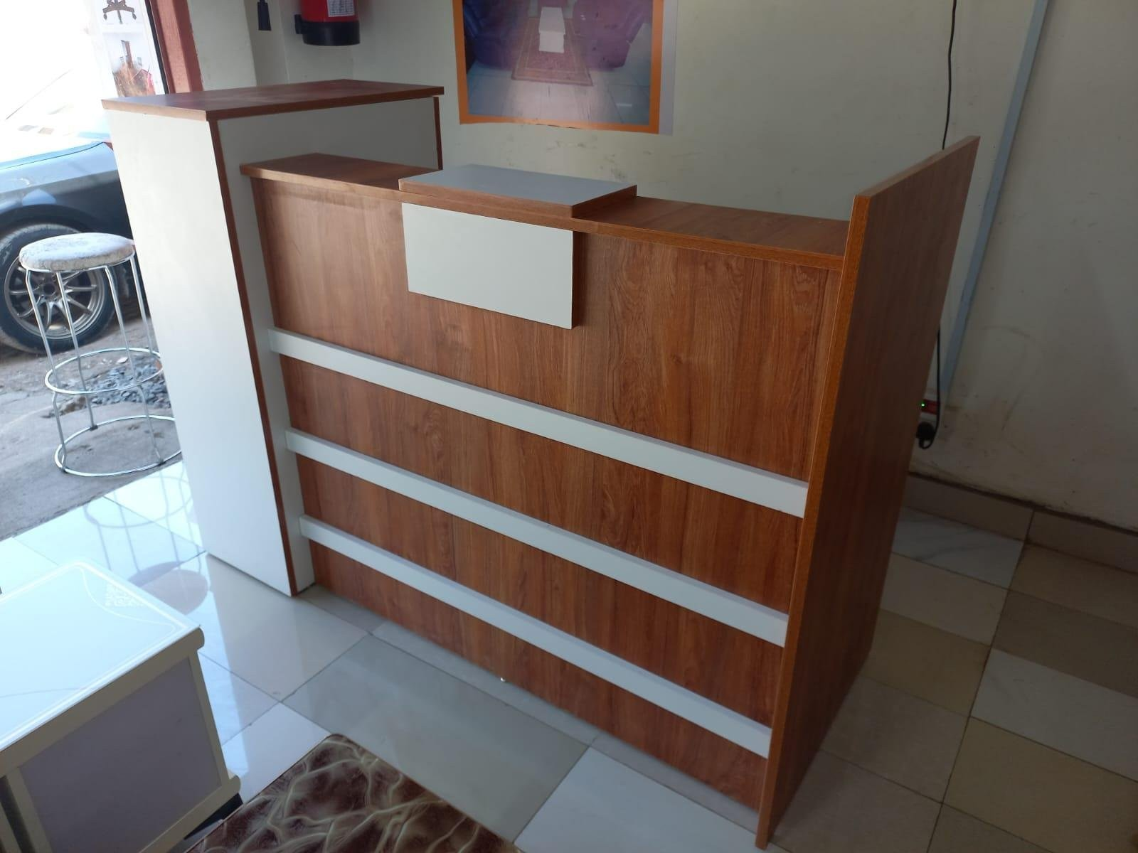 reception desk, modern reception desk, wooden reception desk, glass reception desk, sleek reception desk, executive reception desk, contemporary reception desk, minimalist reception desk, stylish reception desk, compact reception desk, large reception desk, L-shaped reception desk, straight reception desk, modular reception desk, luxury reception desk, office reception desk, front desk, reception counter, hotel reception desk, clinic reception desk, salon reception desk, school reception desk, hospital reception desk, reception desk with storage, reception desk with drawers, reception desk with shelves, reception desk with cabinet, reception desk with countertop, reception desk for office, reception desk for hotel, reception desk for clinic, reception desk for salon, reception desk for school, reception desk for hospital, modern office reception desk, contemporary front desk, reception desk furniture, professional reception desk, commercial reception desk, reception desk for lobby, reception desk for waiting area, executive front desk, reception desk design, ergonomic reception desk, reception desk wood finish, reception desk glass finish, reception desk metal frame, modular office reception desk, functional reception desk, elegant reception desk, reception desk with computer space, reception desk with filing, reception desk online, reception desk deals, reception desk sale, reception desk offers, premium reception desk, budget reception desk, stylish front desk, reception desk for small office, reception desk for large office, modern office counter, reception desk accessories, reception desk equipment, custom reception desk, reception desk manufacturer, reception desk supplier, modern office front desk, reception desk with ergonomic design, reception desk with adjustable counter, multi-purpose reception desk, executive modern reception desk, deluxe reception desk, reception desk with finishing, reception desk with storage drawers, high-end reception desk, reception desk with seating area, modular front desk, reception desk with side cabinets, reception desk for clinics and hospitals, reception desk for corporate offices, reception desk for hotels and lodges, luxury front desk, reception desk with countertop extension, reception desk with visitor space, reception desk with storage compartments, reception desk compact design, reception desk sturdy construction, reception desk lightweight design, reception desk contemporary style, professional front desk furniture, office reception desk collection, premium office reception desk, modern design reception desk, reception desk trendy styles, reception desk minimalist design, reception desk ergonomic workspace,reception desk in Nairobi, reception desk in Mombasa, reception desk in Kisumu, reception desk in Nakuru, reception desk in Eldoret, reception desk in Thika, reception desk in Machakos, reception desk in Naivasha, reception desk in Kitale, reception desk in Kakamega, reception desk in Nyeri, reception desk in Meru, reception desk in Bungoma, reception desk in Garissa, reception desk in Malindi, reception desk in Lamu, reception desk in Voi, reception desk in Kericho, reception desk in Homa Bay, reception desk in Kisii, reception desk in Busia, reception desk in Kitui, reception desk in Nanyuki, reception desk in Isiolo, reception desk in Marsabit, reception desk in Wajir, reception desk in Moyale, reception desk in Ruiru, reception desk in Kiambu, reception desk in Rongai, reception desk in Juja, reception desk in Athi River, reception desk in Ongata Rongai, reception desk in Mavoko, reception desk in Kitengela, reception desk in Limuru, reception desk in Kikuyu, reception desk in Naivasha Town, reception desk in Thika Town, reception desk in Eldoret Town, reception desk in Nakuru Town, reception desk in Kisumu Town, reception desk in Mombasa City, reception desk in Nairobi City, reception desk in Malindi Town, reception desk in Garissa Town, reception desk in Kitale Town, reception desk in Kakamega Town, reception desk in Nyeri Town, reception desk in Meru Town, reception desk in Bungoma Town, reception desk in Homa Bay Town, reception desk in Kisii Town, reception desk in Busia Town, reception desk in Kitui Town, reception desk in Nanyuki Town, reception desk in Isiolo Town, reception desk in Marsabit Town, reception desk in Wajir Town, reception desk in Moyale Town, reception desk in Kitengela Suburb, reception desk in Salgaa, reception desk in Webuye, reception desk in Siaya, reception desk in Bomet, reception desk in Narok, reception desk in Migori, reception desk in Vihiga, reception desk in Bura, reception desk in Hola, reception desk in Wote, reception desk in Makindu, reception desk in Salama, reception desk in Emali, reception desk in Sultan Hamud, reception desk in Kibwezi, reception desk in Nyandarua, reception desk in Nyamira, reception desk in Trans Nzoia, reception desk in Uasin Gishu, reception desk in Kiambu County, reception desk in Kakamega County, reception desk in Busia County, reception desk in Turkana, reception desk in West Pokot, reception desk in Elgeyo Marakwet, reception desk in Baringo, reception desk in Laikipia, reception desk in Samburu, reception desk in Taita Taveta, reception desk in Kwale, reception desk in Kilifi, reception desk in Tana River, reception desk in Butere, reception desk in Mumias, reception desk in Maragwa, reception desk in Murang’a, reception desk in Narok Town, reception desk in Kericho Town, reception desk in Nandi Hills, reception desk in Eldama Ravine, reception desk in Kajiado Town, reception desk in Kilgoris, reception desk in Oyugis, reception desk in Kisii Suburb, reception desk in Isebania, reception desk in Migori Suburb, reception desk in Rongo